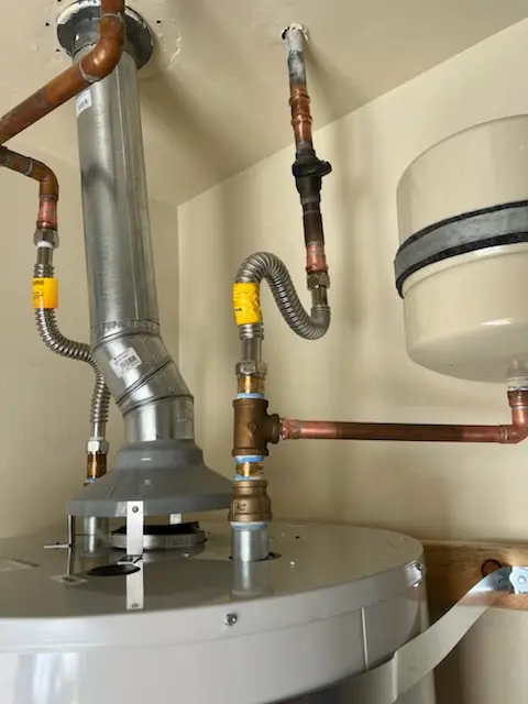 Water heater installation and plumbing repair in Farnham